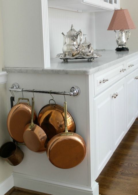 Try A Towel Bar To Organize All Those Pots And Pans